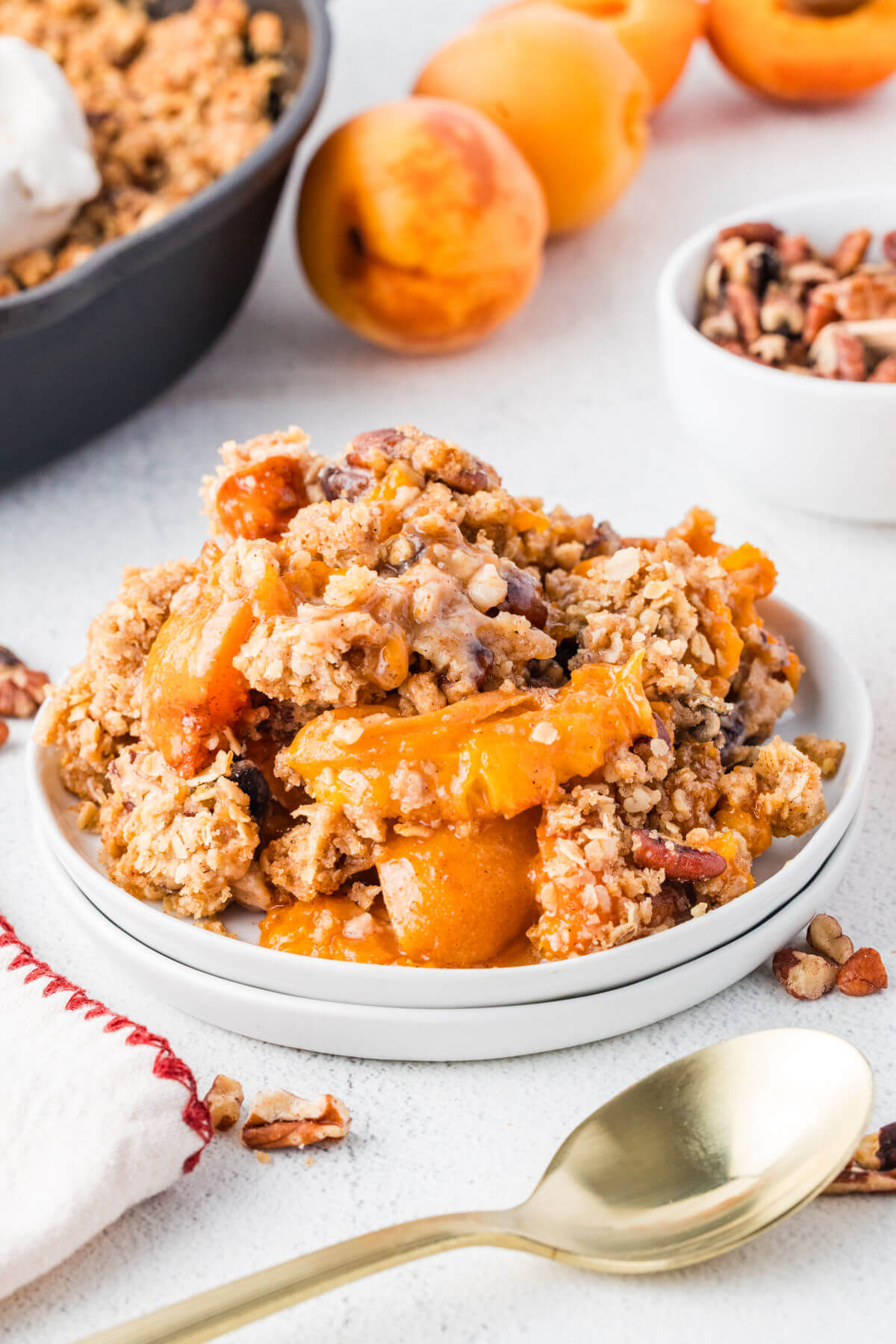 Apricot crumble on a plate after baking.