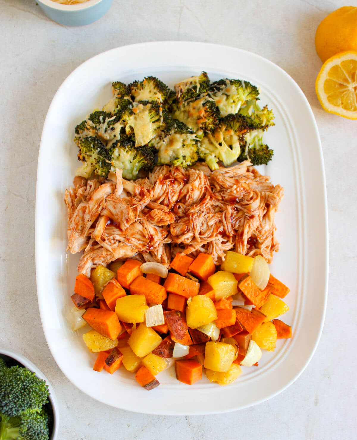 BBQ chicken sheet pan dinner on a plate.