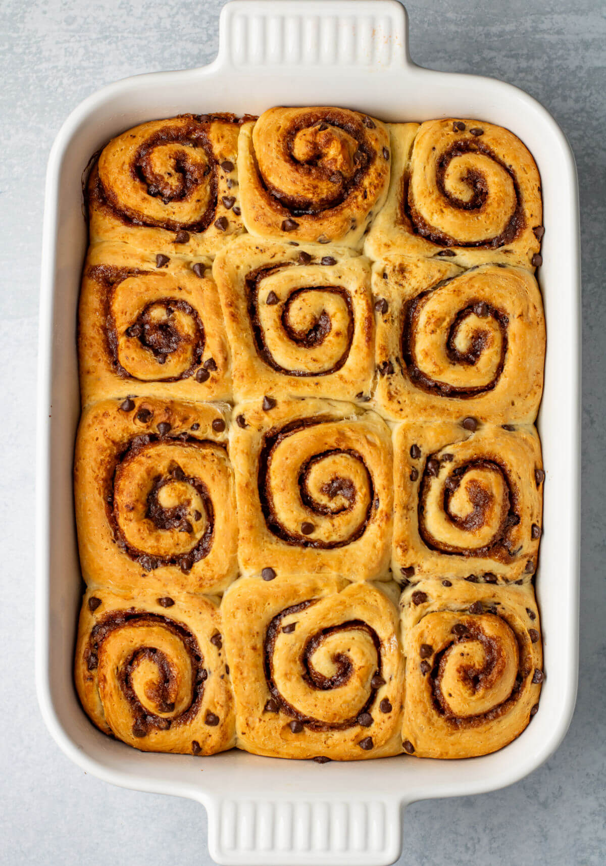 A baked pan of cinnamon rolls.
