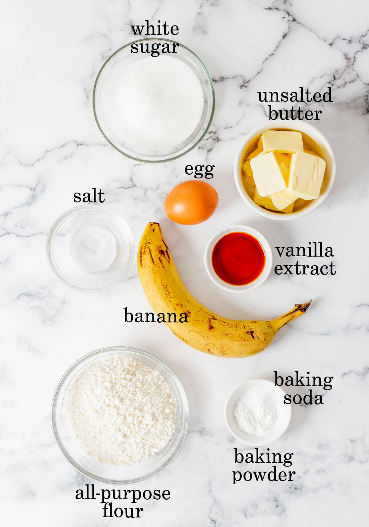 Ingredients for quick and easy banana bread in small bowls.