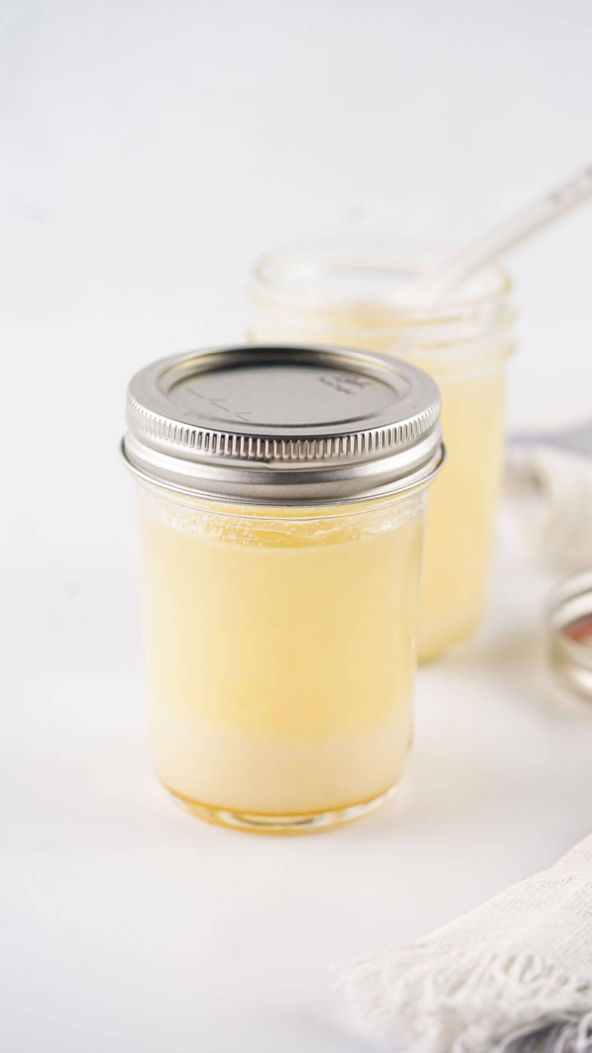 Homemade beef tallow in a mason jar with a lid.