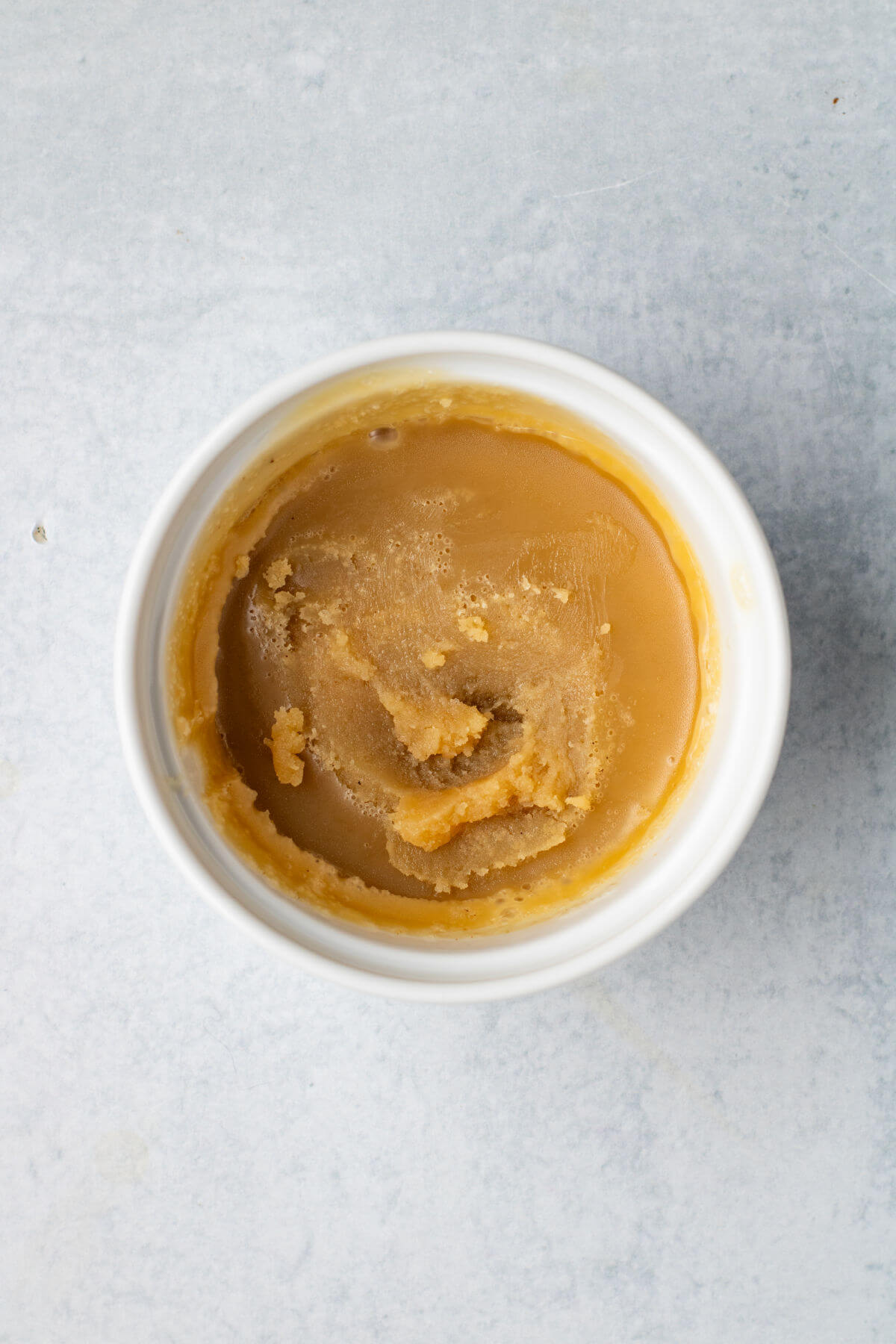 A bowl of brown butter frosting.