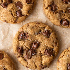 Brown butter chocolate chip cookies on a baking sheet.