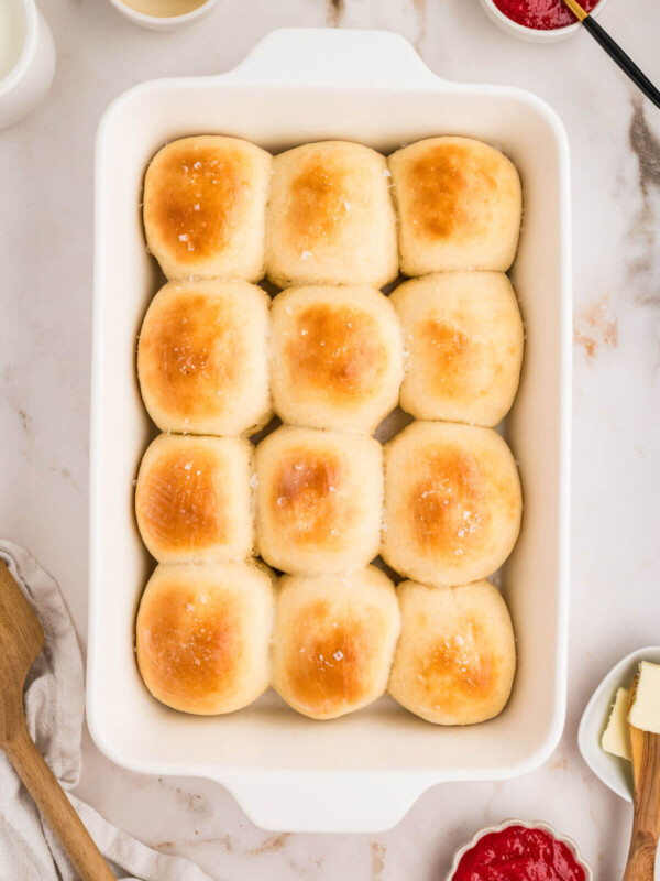 Oatmeal dinner rolls in a baking dish.
