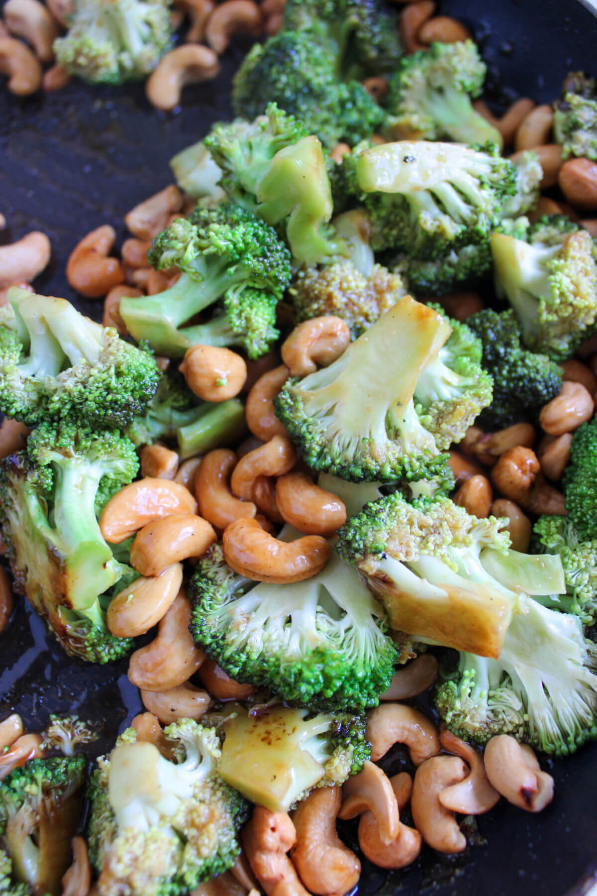 Making easy cashew chicken in a skillet.