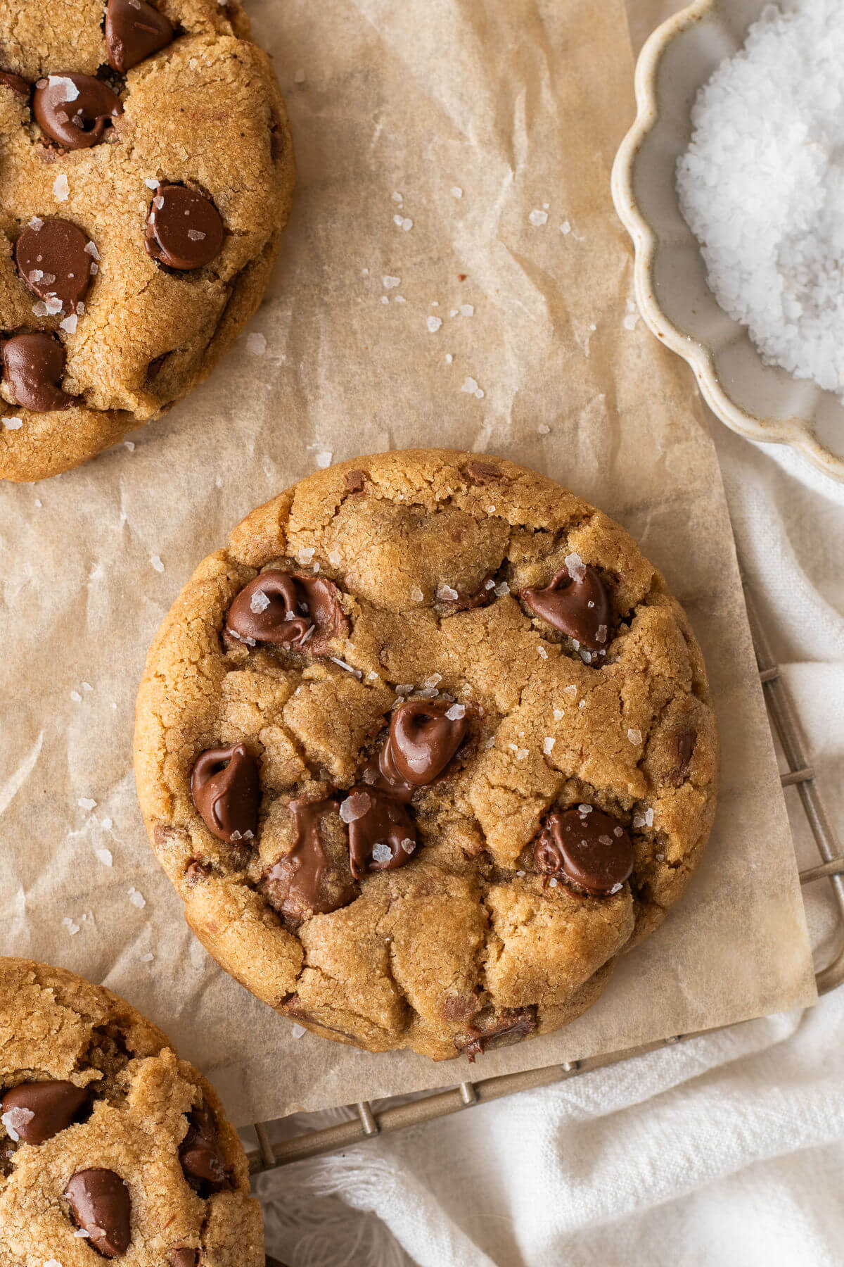 Brown butter chocolate chip cookies on a wire rack.