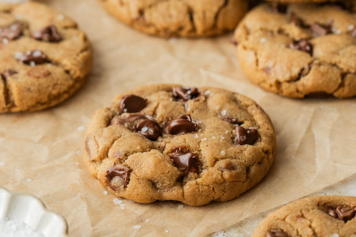 Brown butter chocolate chip cookies on a wire rack.