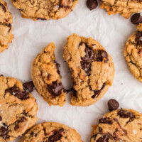 Brown butter sourdough chocolate chip cookies on a baking sheet after baking.