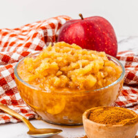 Homemade applesauce in a clear bowl.