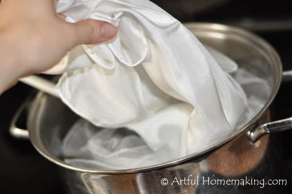 putting blank silks into a pot of water with vinegar