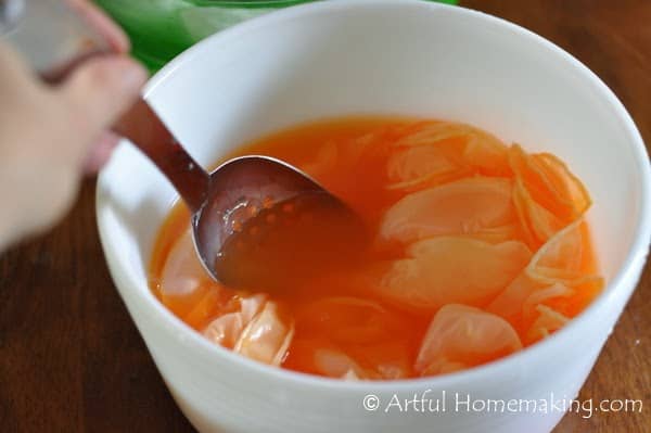 stirring Kool-Aid dyed water to dye a playsilk