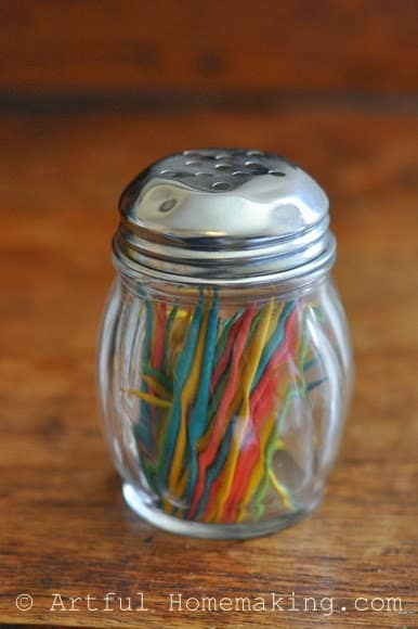 colored toothpicks in a cheese shaker toddler activity