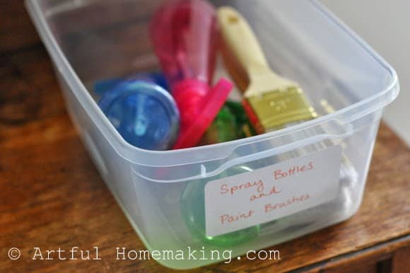 spray bottles and paint brushes activity
