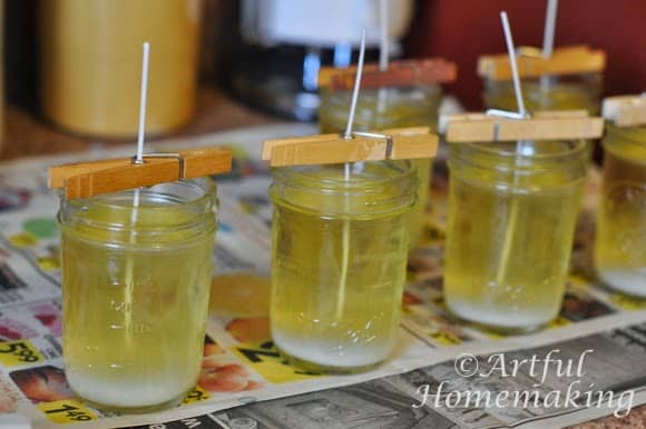 melted soy wax in jars starting to cool