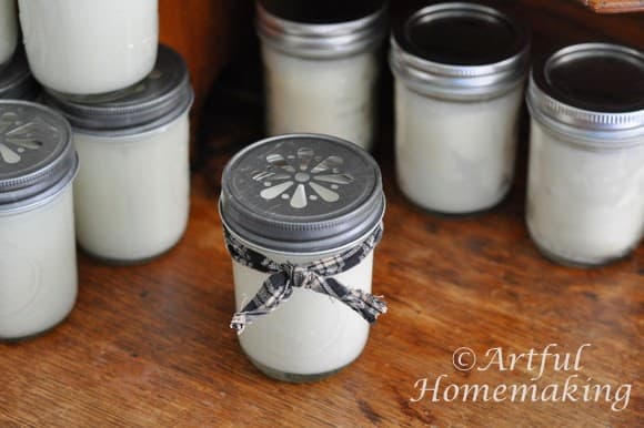 a homemade soy candle with a decorative lid
