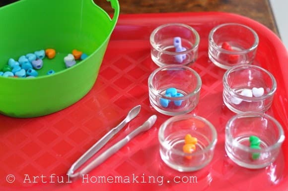 tongs, beads, tea light holders fine motor preschool activity