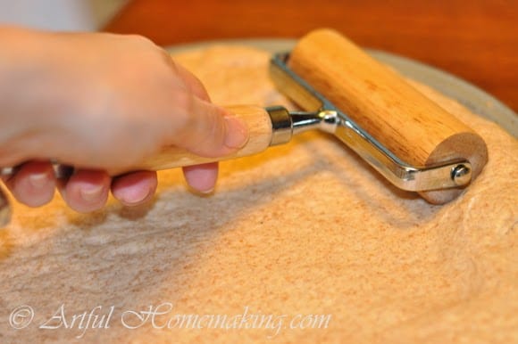 rolling pizza dough