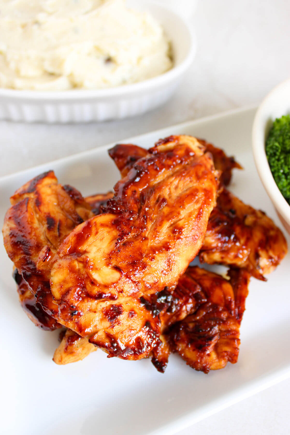 Honey mustard chicken tenders on a platter.