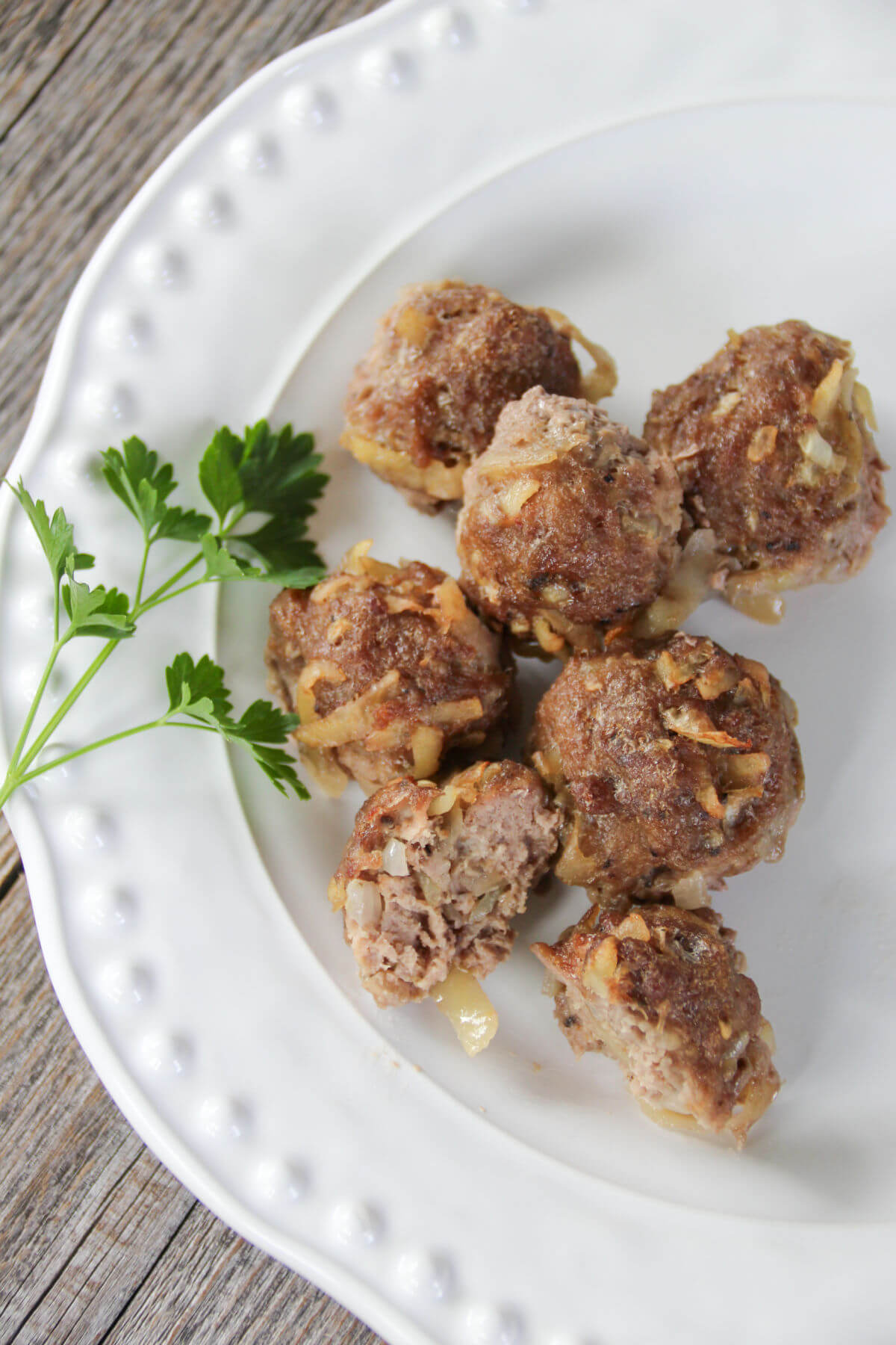 Savory meatballs on a plate.