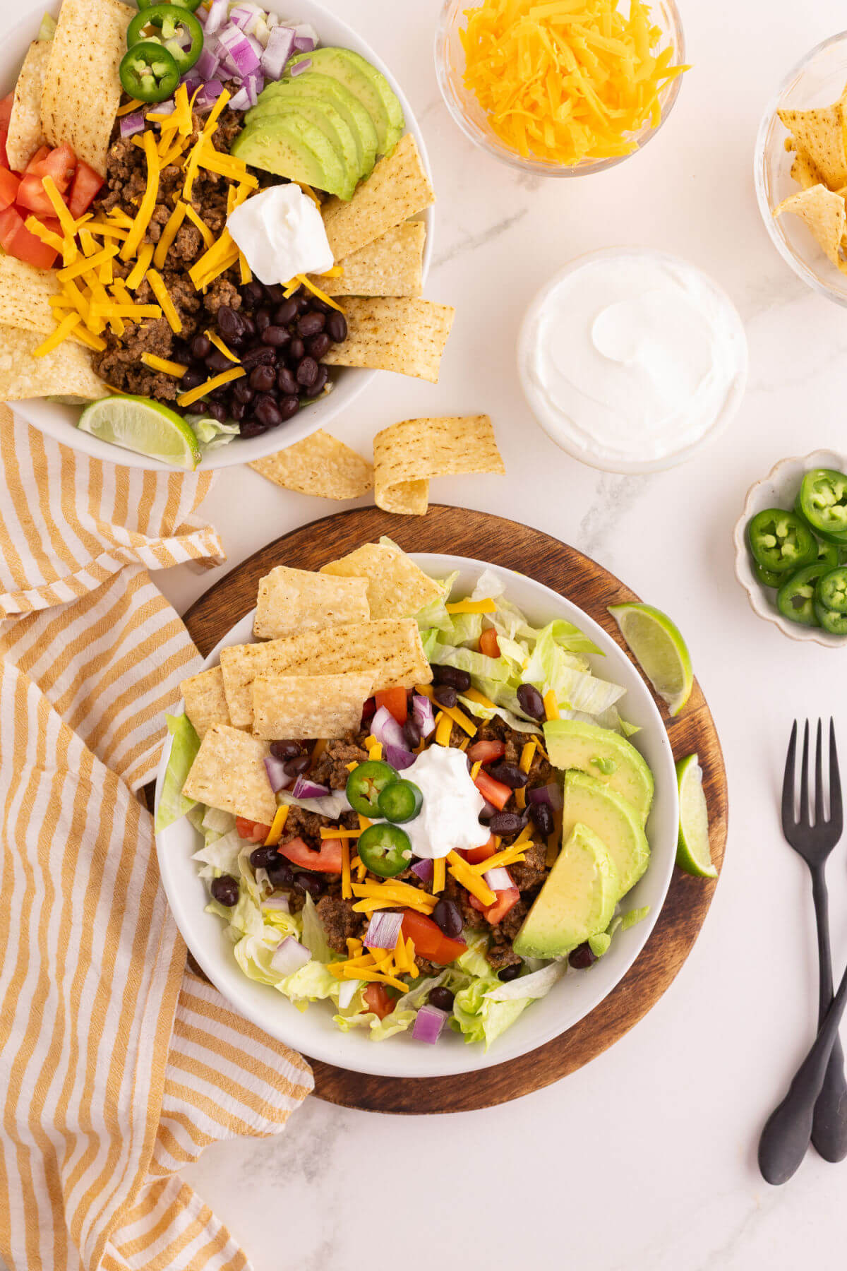 Easy taco salad recipe in two serving bowls.