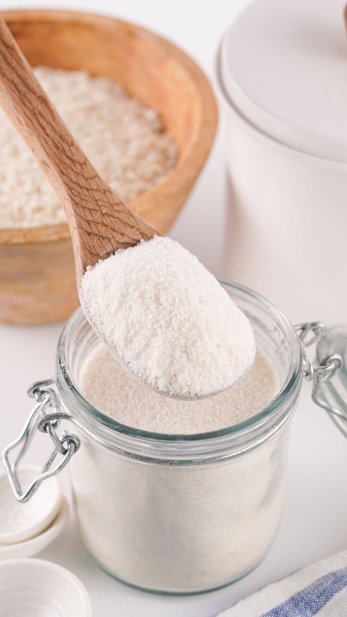 Homemade rice flour in a glass jar.