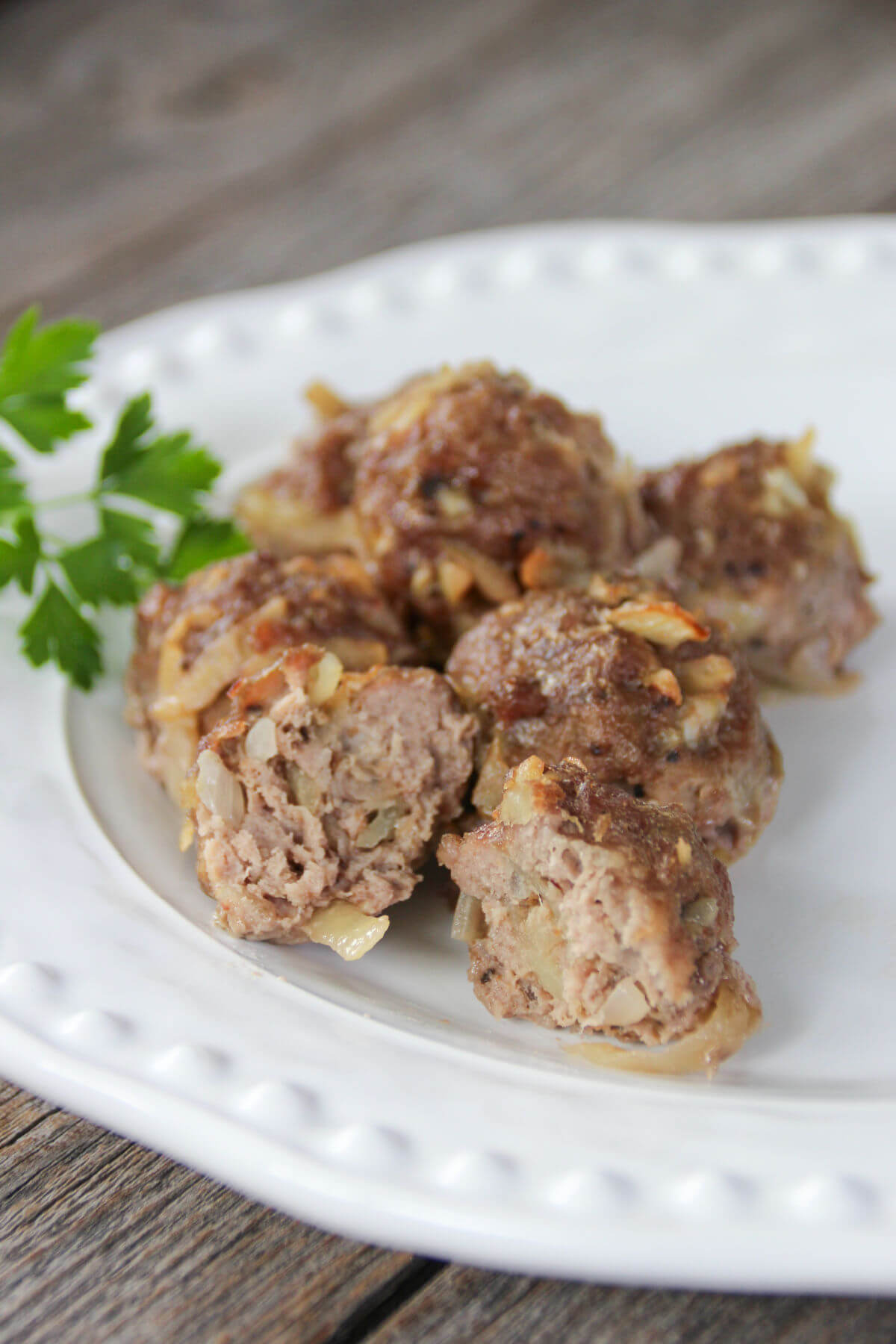 Savory meatballs on a plate.