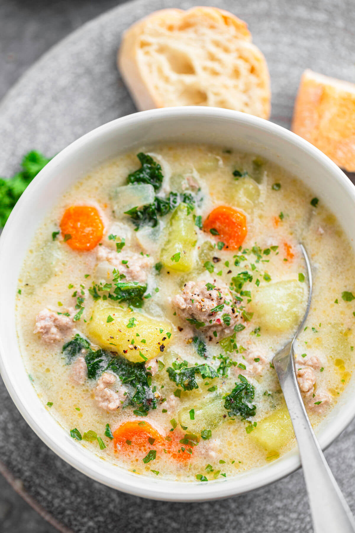 a bowl of sausage kale soup