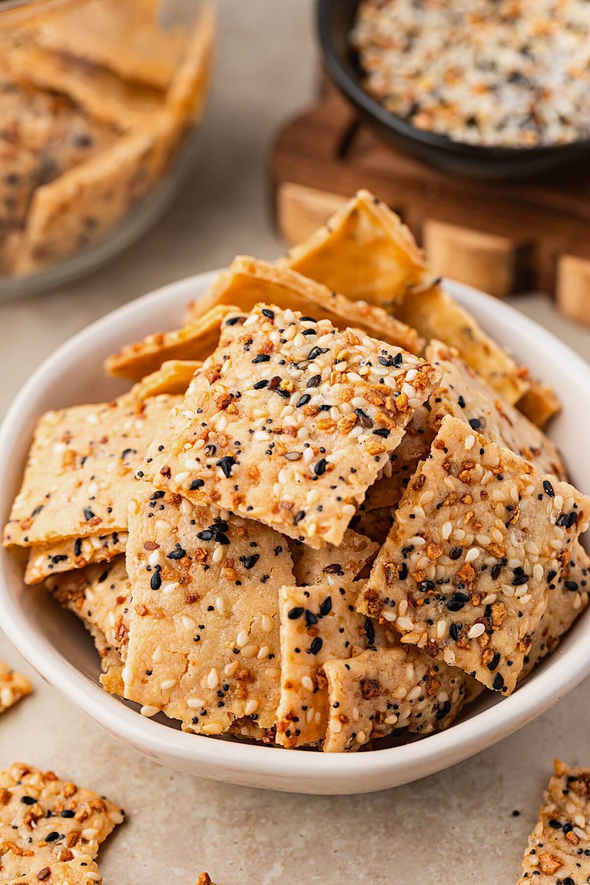 Everything sourdough crackers in a bowl for serving.