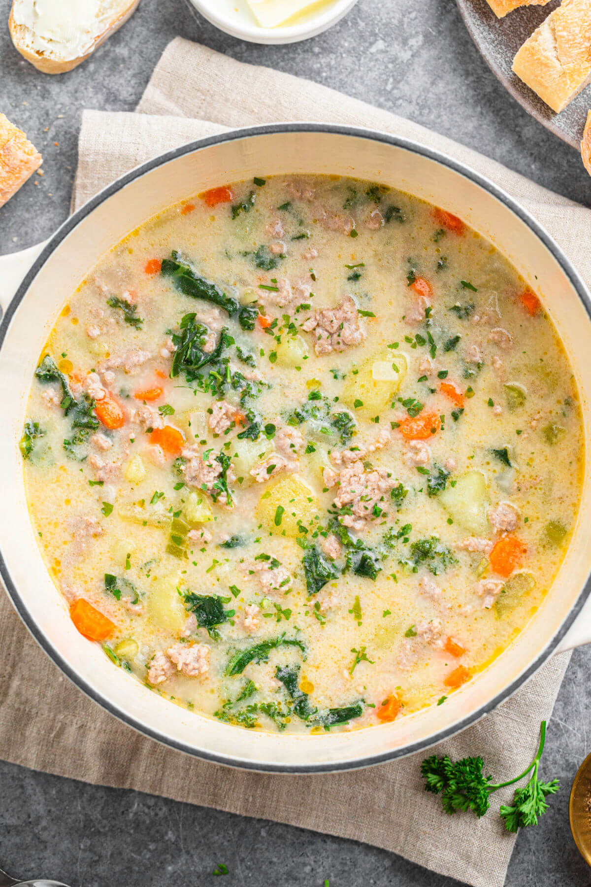 a pot filled with Tuscan sausage soup