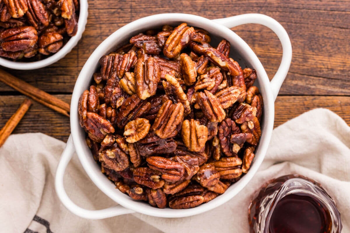 Candied maple pecans in a bowl.