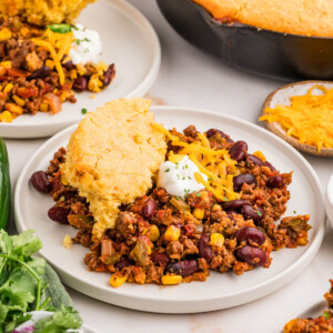 Chili cornbread casserole on a plate.