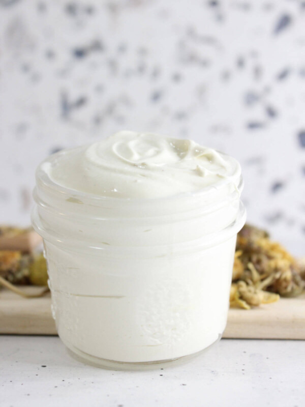 Homemade diaper cream in a glass jar.
