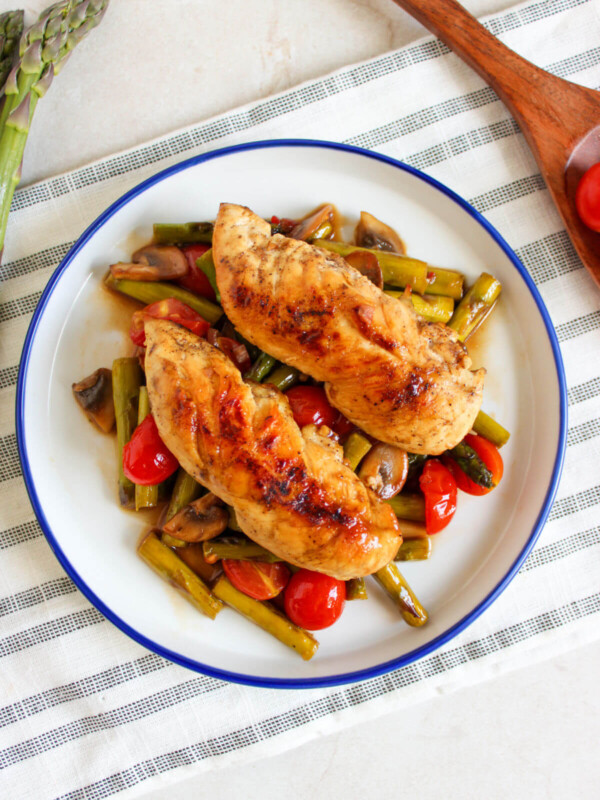 One pan chicken and vegetables on a plate for serving.