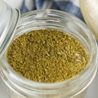 Homemade poultry seasoning in a mason jar.