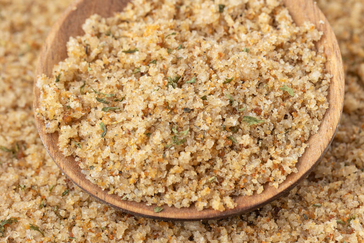 Seasoned breadcrumbs on a spoon.