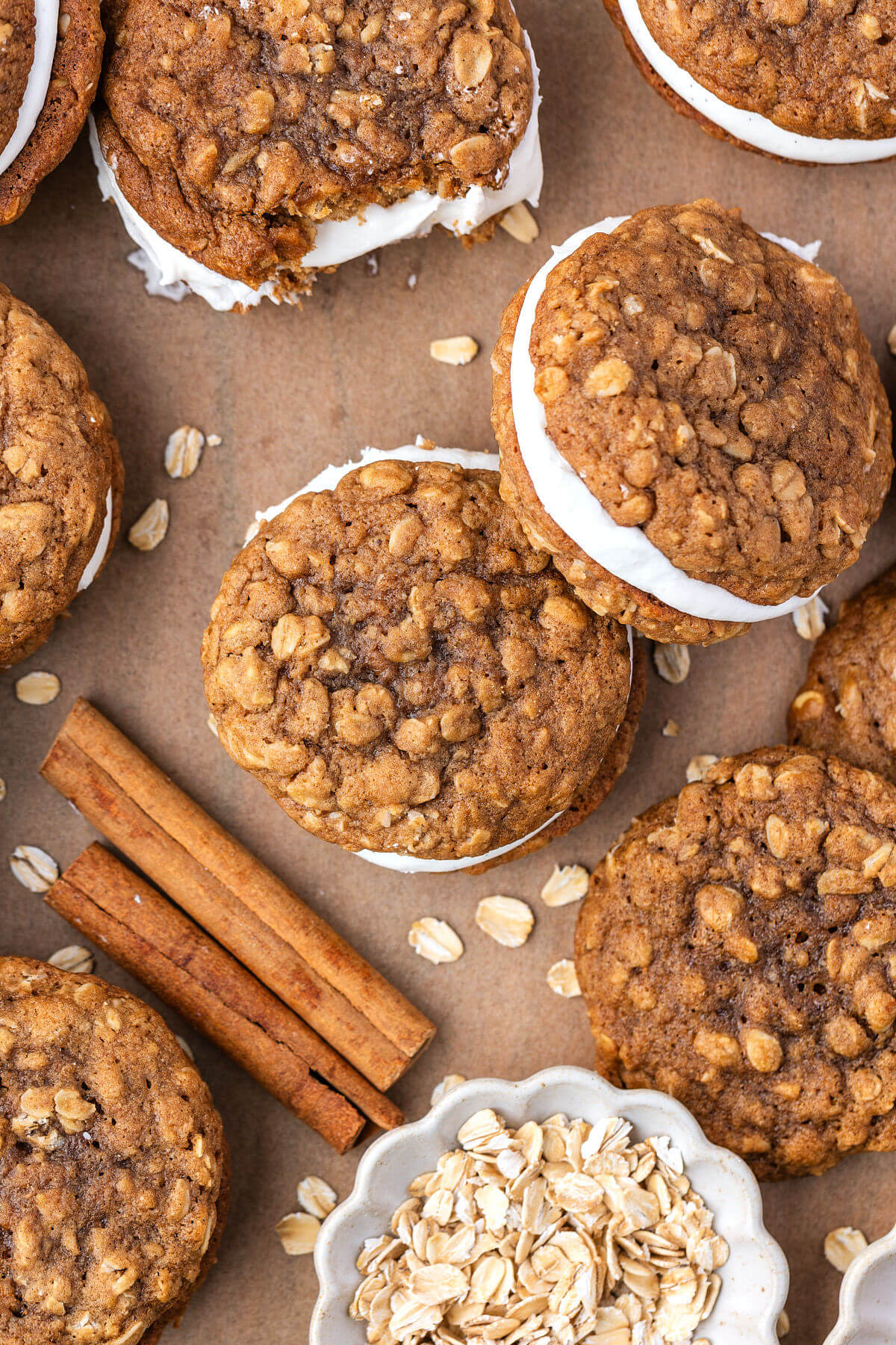Sourdough oatmeal cream pies on a piece of parchment paper.