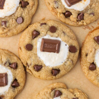 Sourdough s'mores cookies on a piece of parchment paper.
