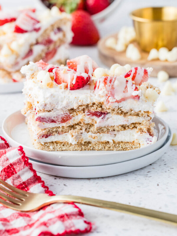 Piece of strawberry icebox cake on a serving plate.