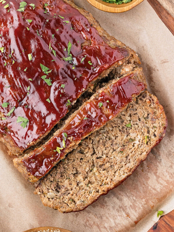 Glazed meatloaf recipe cut into slices.