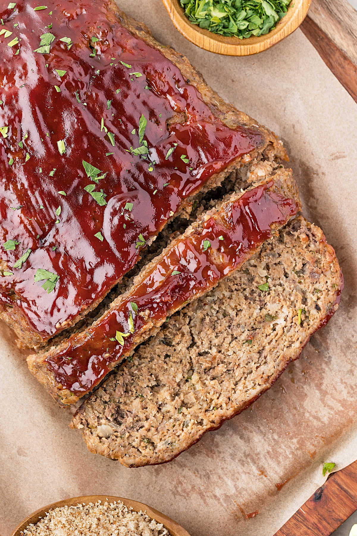 Glazed meatloaf recipe cut into slices.