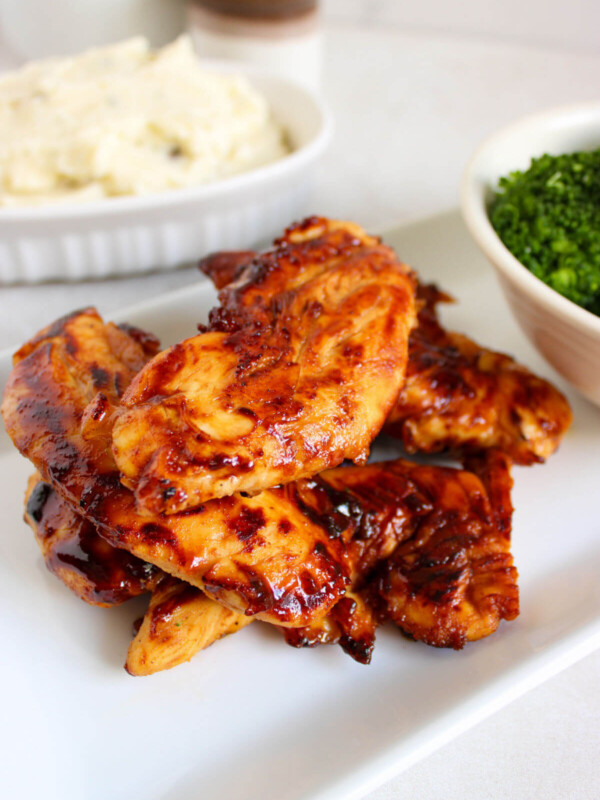Honey mustard chicken tenders on a serving platter.