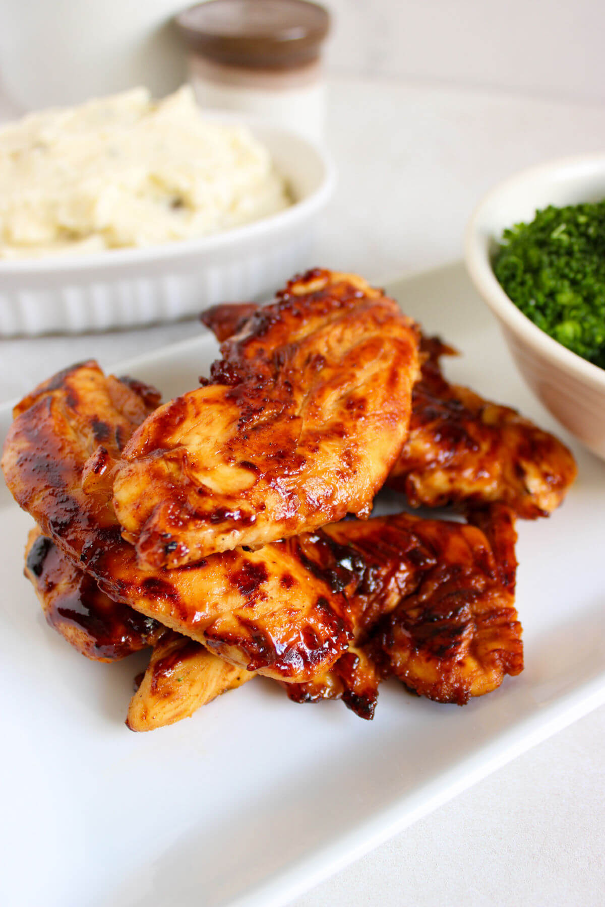 Honey mustard chicken tenders on a serving platter.