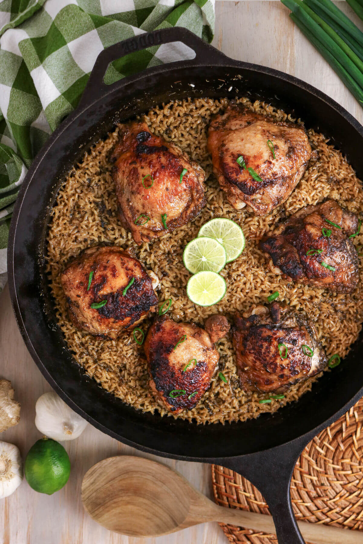 Jerk chicken and rice recipe in a cast iron skillet.