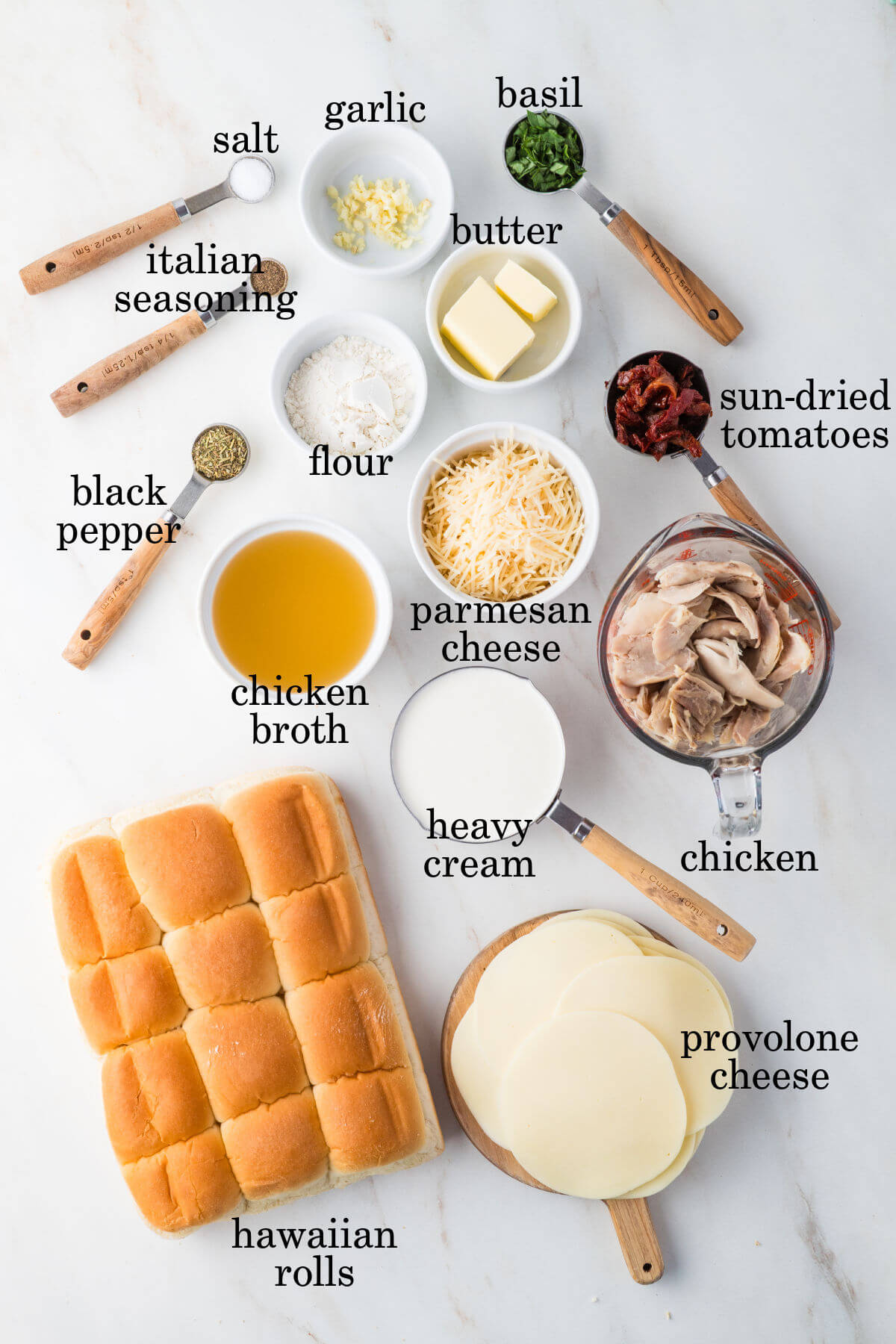 Ingredients for marry me chicken sliders with labeled text overlay labeling each ingredient.