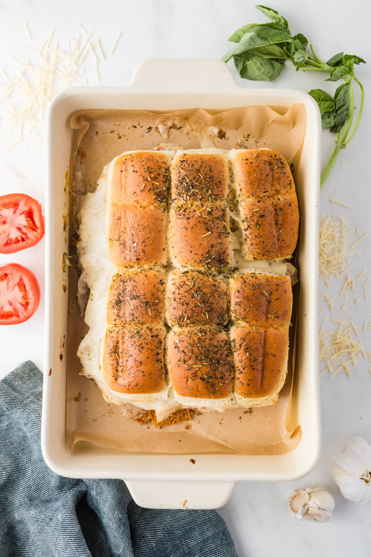 Marry me chicken sliders in a baking dish after baking.