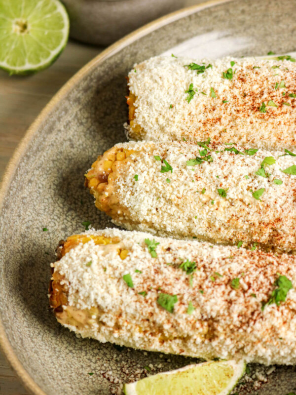 Easy Mexican street corn recipe on a plate for serving.