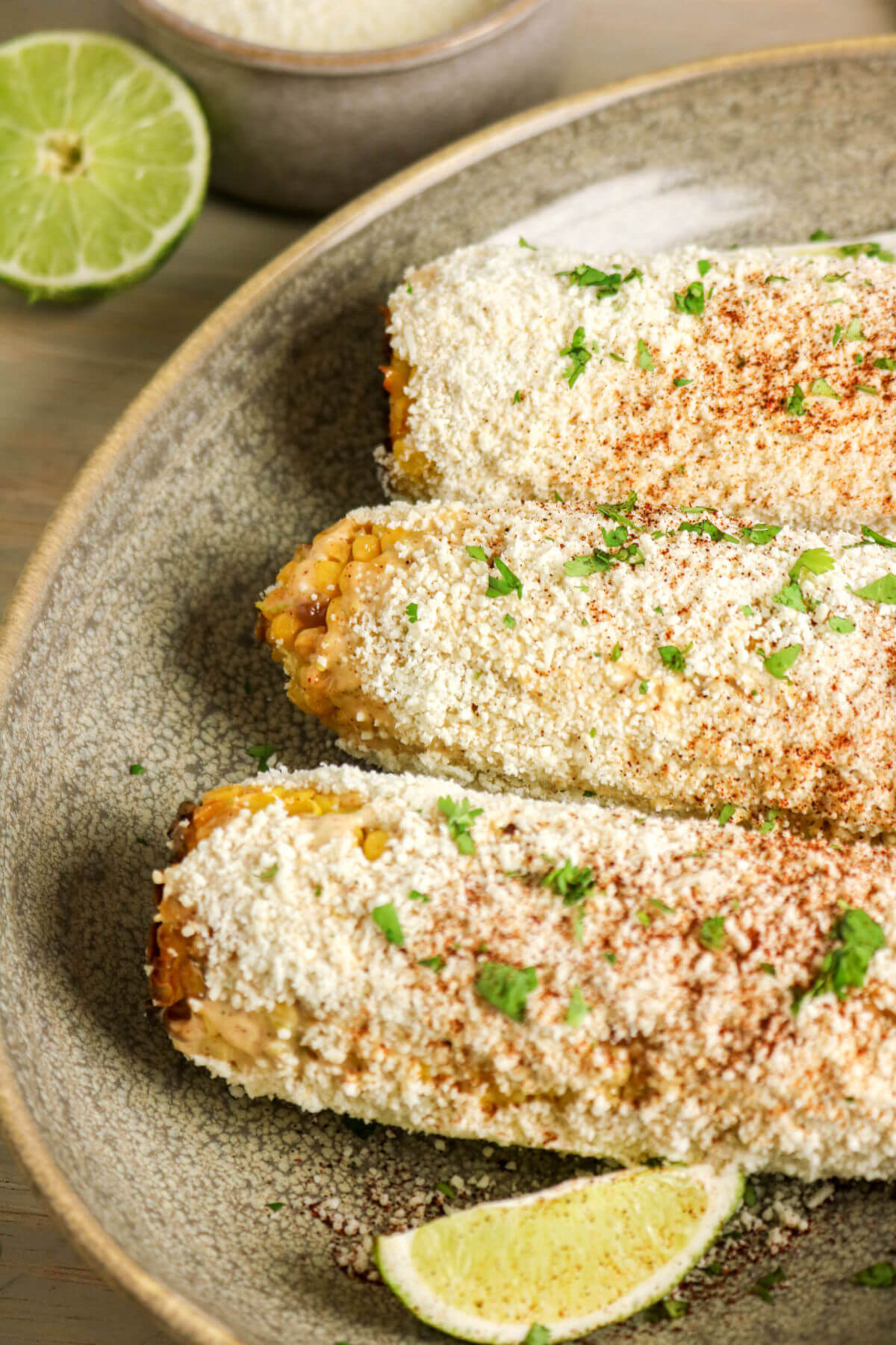Easy Mexican street corn recipe on a plate for serving.