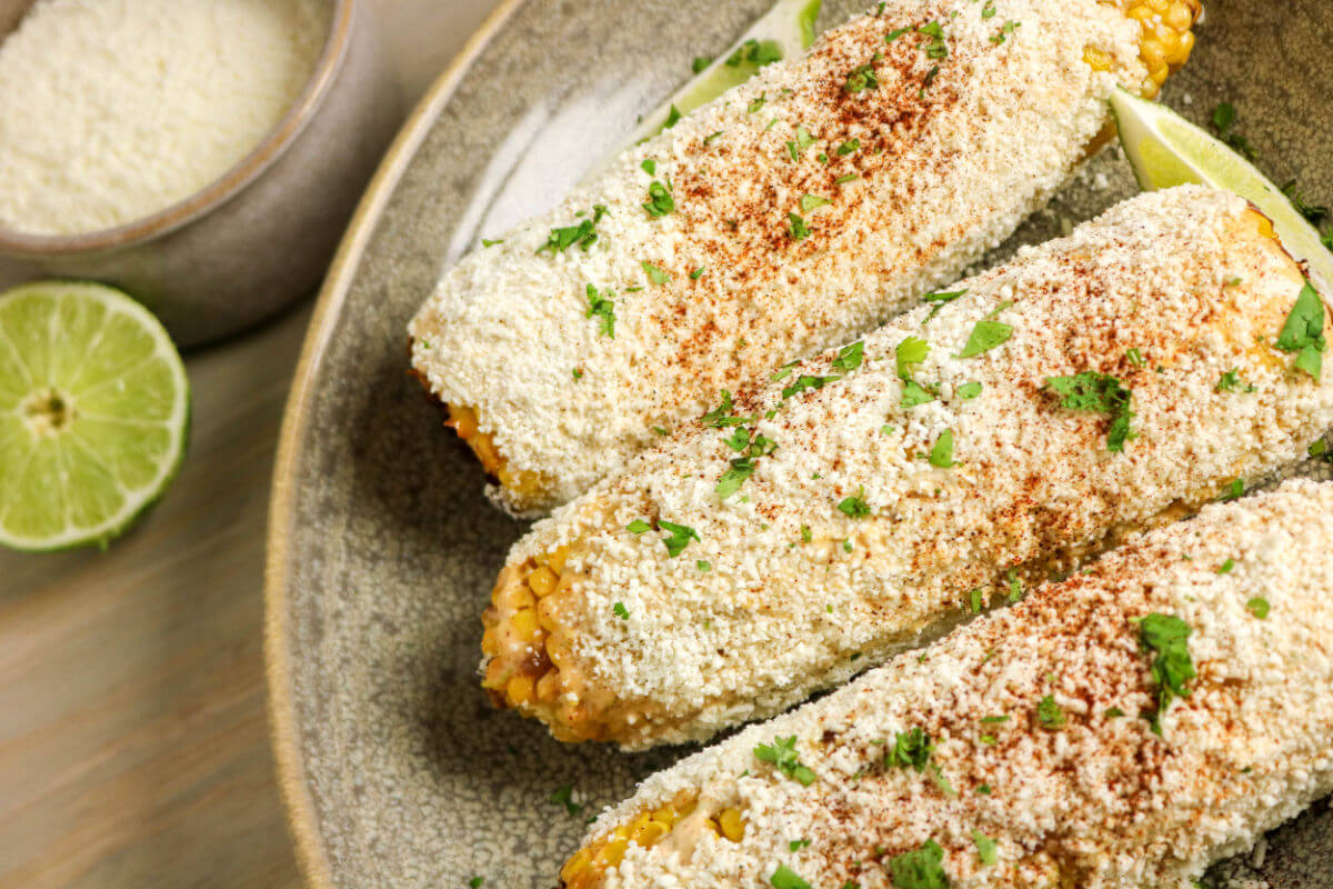 Easy Mexican street corn recipe ready to serve on a platter.