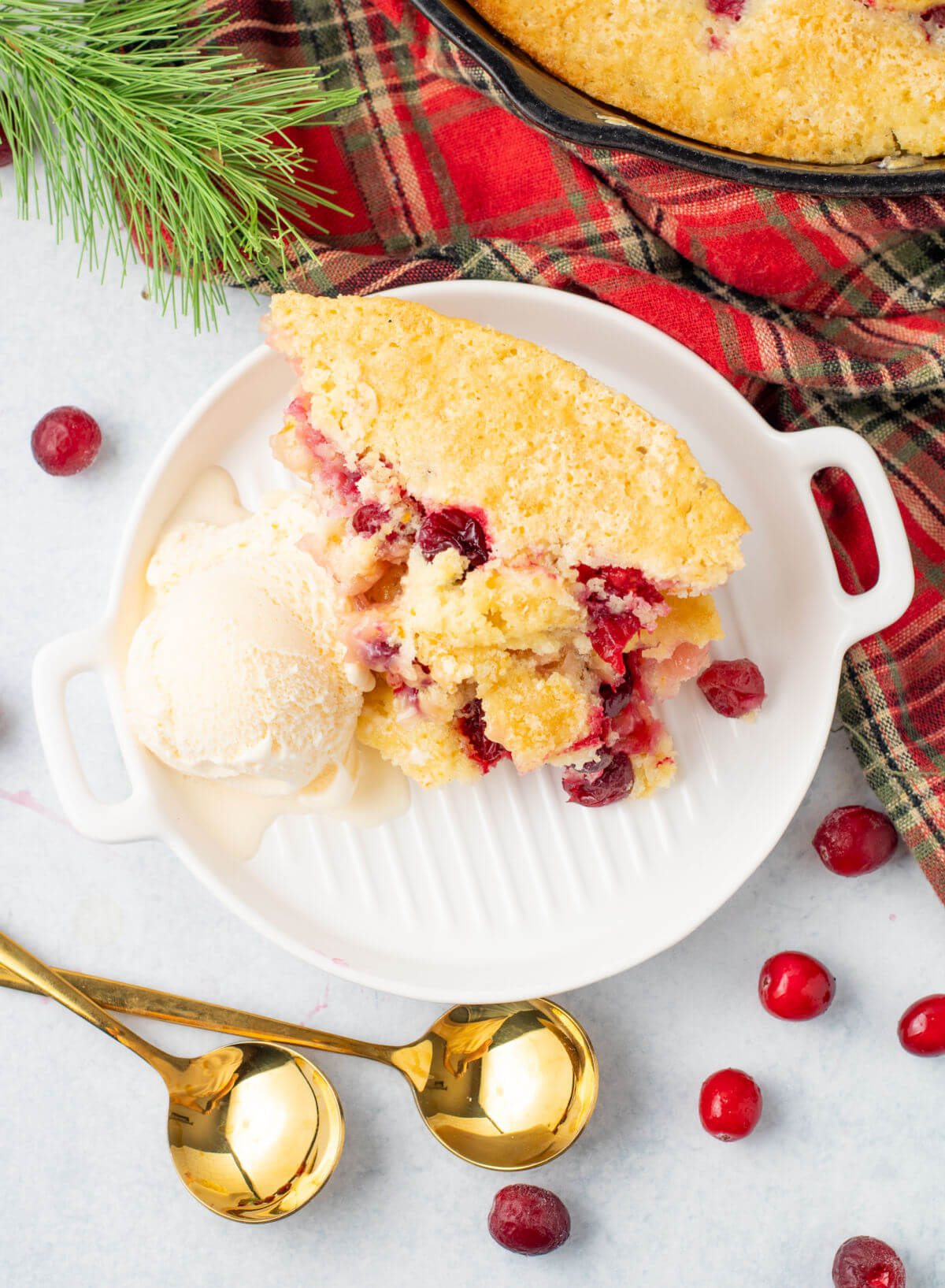 Cranberry orange cobbler on a plate.