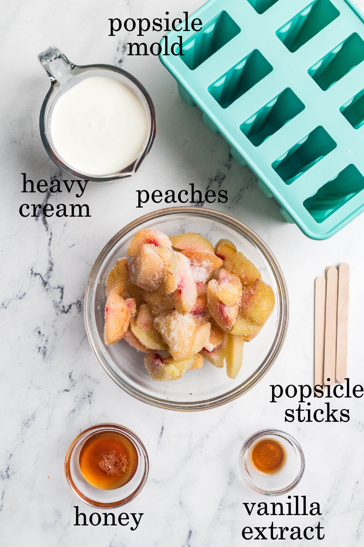 Ingredients for peaches and cream popsicles in small bowls.